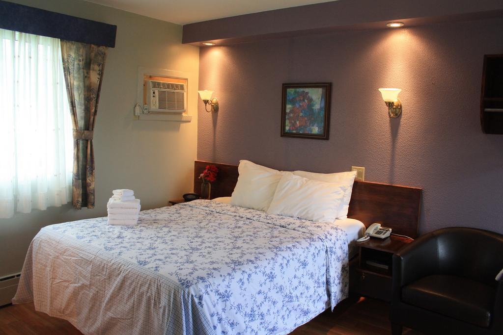 Au Doc Motel Repentigny Quarto foto