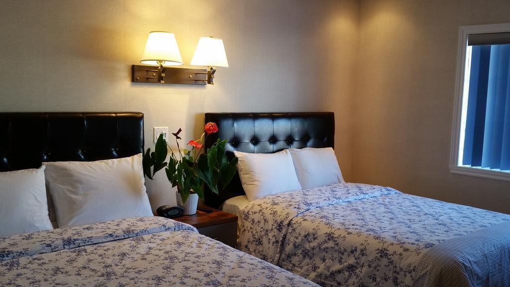 Au Doc Motel Repentigny Quarto foto